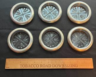 C105 - $35. Set of 6 Sterling Rimmed Coasters.