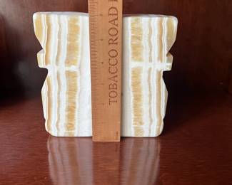 C43 - $30. Marble / Agate Bookends. Measures 2.75" wide x 2" deep x 6" tall.