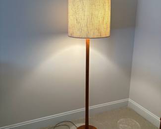 C33 - $175. MCM Teak Wood Base Floor Lamp. Measures 60" tall. Has original shade that is in fair condition.