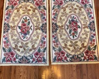 C24 - $200. Set of 3 Hooked Rugs from Petit Point (MER). 100% wool. Largest measures 66" x 43". 2 Smaller measures 47" x 30".