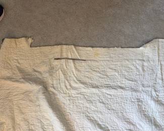 C71 - $50. Antique Quilt - probably a cutter. Measures 84" x 99". Has holes and wear throughout.