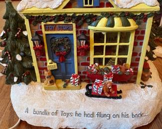 C80 - $40. Lot of 5 Christmas Village: 3 Hallmark, 1 Lord & Taylor, 1 unbranded multi plug. Excellent condition. 8" - 10" tall.