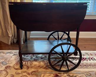 C29 - $75. Wheeled Tea Cart. Measures 27" x 17.5" x 28.5". Each leaf adds an additional 9.75".