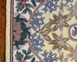 C24 - $200. Set of 3 Hooked Rugs from Petit Point (MER). 100% wool. Largest measures 66" x 43". 2 Smaller measures 47" x 30".