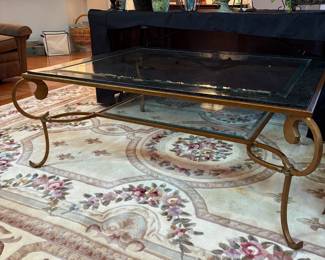 C69 - $75. Large Metal & Glass Coffee Table. Double Layered. Measures 54" x 44" x 20.25" tall.