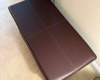 C56 - $30. FHE Storage Bench with Padded Lid. Like new, brown faux leather. Measures 31.5" x 16" x 16" tall.