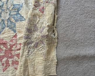 C71 - $50. Antique Quilt - probably a cutter. Measures 84" x 99". Has holes and wear throughout.