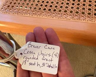 C125 - $200. Breuer Cane Cesca Cantilever Chairs. set of 4 with rounded fronts. 18" seat height, 31" total height. Very good overall condition - 1 seat has minor breakage - 1 chair has scratches on the front.