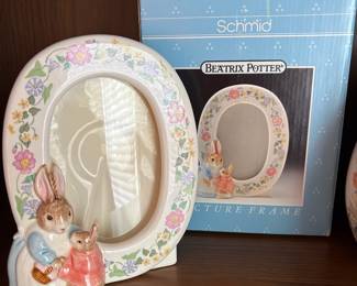 C51 - $40. 10 Piece Beatrix Potter / Peter Rabbit LOT. Cross Stitch, music box, Beswick Figurine, Royal Albert, Wedgwood, etc.