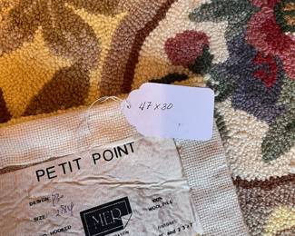 C24 - $200. Set of 3 Hooked Rugs from Petit Point (MER). 100% wool. Largest measures 66" x 43". 2 Smaller measures 47" x 30".