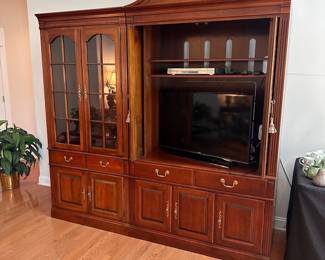 C3 - $150 for the pair. Pennsylvania House TV Cabinet. Moves in 2 pieces. (willing to split if I have interest) Larger part holding the TV is 48" wide x 24" deep x 88" tall. (TV space measures 37.5" x 43" tall and is currently holding a 40" TV.) Smaller cabinet with adjustable glass shelves measures 36" wide x 18" deep x 78" tall.