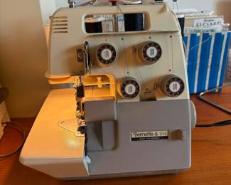 C62 - $150. Bernette 234 Serger for Bernina. Powers on and seems to work correctly. Has cover, roll hemming attachment & blind stitch attachment.