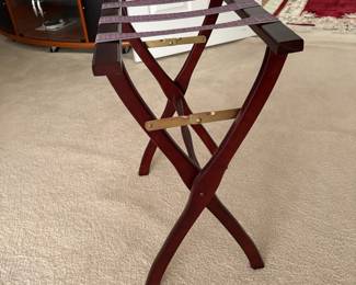 C47 - $20. Thomas Pacconi Classics Mahogany Finish Luggage Rack. Overall very good condition - has minor knicks in the wood. Measures 22" x 12" x 14" tall.