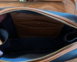 C10 - $45. Vintage Y2K Dooney & Bourke Camera Bag. Crossbody, Black Pebble Leather. Measures 10" x 3" x 7".