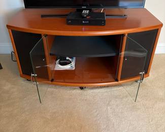 C35 - $40. Media Cabinet with 4 doors on the front. (That's a 40" TV on it)