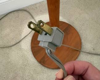 C33 - $175. MCM Teak Wood Base Floor Lamp. Measures 60" tall. Has original shade that is in fair condition.