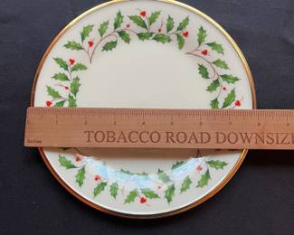 C104 - $110. Lenox Holiday China Set. 12 - 8" plates. 12 - drinking glasses. 1 cookie jar, vase, serving bowl, serving plate, 11.75" serving plate, 10.5" serving plate, 8" serving plate, 1 candle holder.