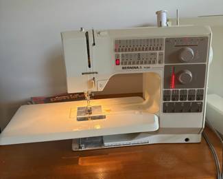 C58 - $400. Bernina 1130 Sewing Machine. Turns on and pedal works! Comes with 5 instruction booklets and cover.