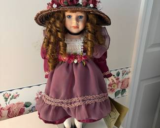 C61 - $20. Seymour Mann "Heather" Doll. Measures 17" tall and includes stand.