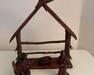 C65 - $60. Carved wood nativity from South Korea. 15pc. Lamb & Donkey need easy repairs. Measures 12" tall. 3 sheep were added but very similar wood.