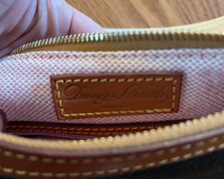 C12 - $75. Vintage Y2K Dooney & Bourke Black Pebble Leather Hobo Bag / Purse with matching wristlet. Measures 13" x 5.5" x 9".