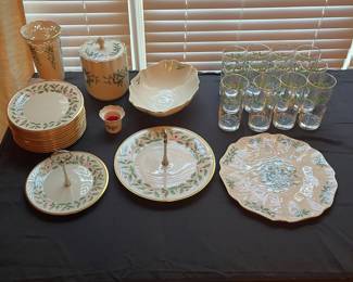 C104 - $110. Lenox Holiday China Set. 12 - 8" plates. 12 - drinking glasses. 1 cookie jar, vase, serving bowl, serving plate, 11.75" serving plate, 10.5" serving plate, 8" serving plate, 1 candle holder.