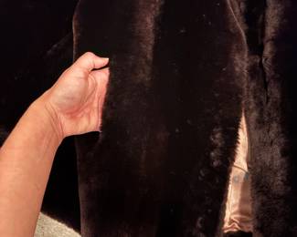 C48 - $95. Vintage Sheared Fur (Beaver?) Swing Coat. Has 2 hook closures , hidden pockets and is in Excellent Condition. Measures 28" long down the middle back x 18" shoulder to shoulder.