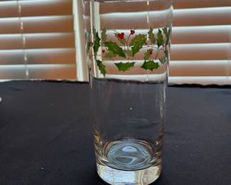 C104 - $110. Lenox Holiday China Set. 12 - 8" plates. 12 - drinking glasses. 1 cookie jar, vase, serving bowl, serving plate, 11.75" serving plate, 10.5" serving plate, 8" serving plate, 1 candle holder.