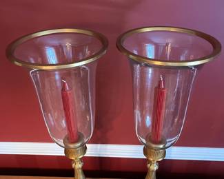 C26 - $50. Pair of Vintage Brass Candle Holders with tall glass hurricane shades. Measures 9.25" wide x 27.25' tall.