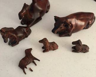C65 - $60. Carved wood nativity from South Korea. 15pc. Lamb & Donkey need easy repairs. Measures 12" tall. 3 sheep were added but very similar wood.