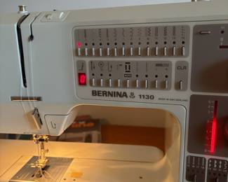 C58 - $400. Bernina 1130 Sewing Machine. Turns on and pedal works! Comes with 5 instruction booklets and cover.