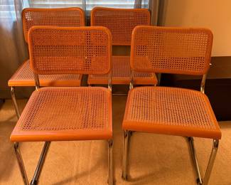 C125 - $200. Breuer Cane Cesca Cantilever Chairs. set of 4 with rounded fronts. 18" seat height, 31" total height. Very good overall condition - 1 seat has minor breakage - 1 chair has scratches on the front.