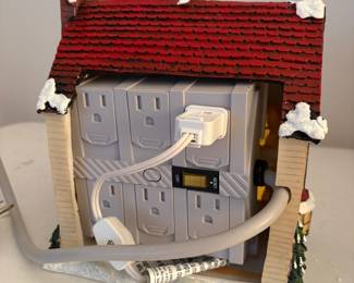 C80 - $40. Lot of 5 Christmas Village: 3 Hallmark, 1 Lord & Taylor, 1 unbranded multi plug. Excellent condition. 8" - 10" tall.