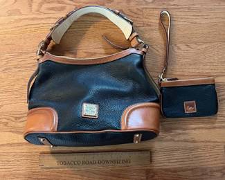 C12 - $75. Vintage Y2K Dooney & Bourke Black Pebble Leather Hobo Bag / Purse with matching wristlet. Measures 13" x 5.5" x 9".