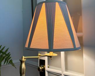 C92 - $75. Swing Arm Brass Floor Lamp. Measures 60" tall.