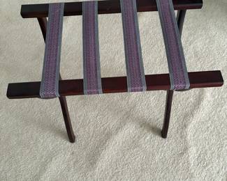 C47 - $20. Thomas Pacconi Classics Mahogany Finish Luggage Rack. Overall very good condition - has minor knicks in the wood. Measures 22" x 12" x 14" tall.