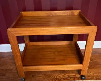 C31 - $125. Two Tiered Bar Cart. Solid Wood. No name / tag. Measures 30" x 19.75" x 25.75".