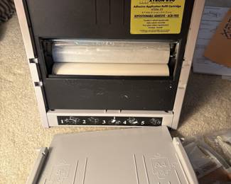 C64 - $20. Xyron 850 Laminating System. Has laminating paper loaded, an extra cartridge and a 2" & 4" adhesive runner with refills.