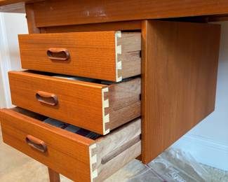 C18 - $650. Arne Vodder for H. Sigh & Sons. Teak Drop Leaf Writing Desk. Measures 48" x 23.5" x 28" tall. (65" with leaf up) Needs minor repairs and has light surface blemishes.