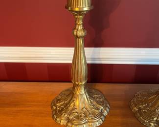 C26 - $50. Pair of Vintage Brass Candle Holders with tall glass hurricane shades. Measures 9.25" wide x 27.25' tall.