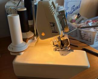 C62 - $150. Bernette 234 Serger for Bernina. Powers on and seems to work correctly. Has cover, roll hemming attachment & blind stitch attachment.
