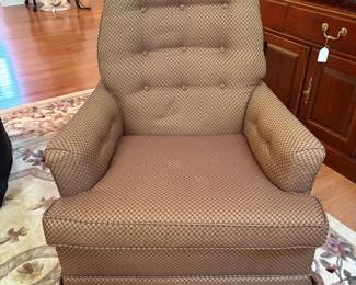 C70 - $75. Middletown brown diamond patterned swivel rocker with button tufting. Measures 31" wide x 36" deep x 35" tall. Floor to seat is 17". Great Condition.