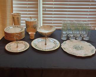 C104 - $110. Lenox Holiday China Set. 12 - 8" plates. 12 - drinking glasses. 1 cookie jar, vase, serving bowl, serving plate, 11.75" serving plate, 10.5" serving plate, 8" serving plate, 1 candle holder.