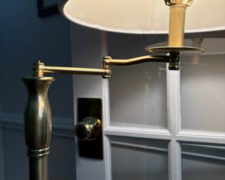 C92 - $75. Swing Arm Brass Floor Lamp. Measures 60" tall.