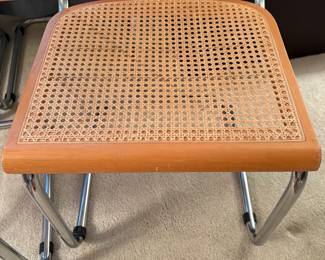 C125 - $200. Breuer Cane Cesca Cantilever Chairs. set of 4 with rounded fronts. 18" seat height, 31" total height. Very good overall condition - 1 seat has minor breakage - 1 chair has scratches on the front.