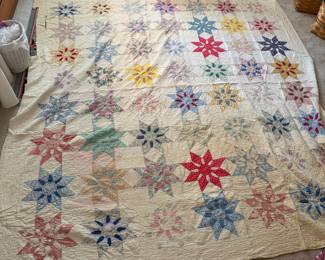 C71 - $50. Antique Quilt - probably a cutter. Measures 84" x 99". Has holes and wear throughout.