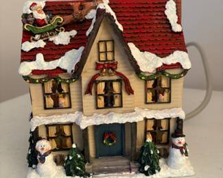 C80 - $40. Lot of 5 Christmas Village: 3 Hallmark, 1 Lord & Taylor, 1 unbranded multi plug. Excellent condition. 8" - 10" tall.