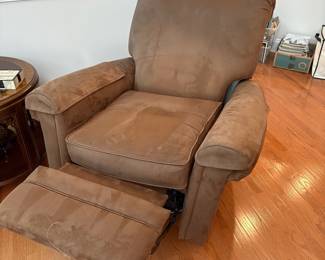C81 - $10. Brown Suede Barca Lounger Swivel Recliner. Fair Condition. Seat spring and left arm are broken. Measures 38" wide x 36" deep x 38" tall.