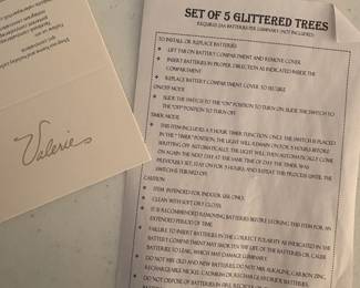 C67 - $30. Valerie 5 White Glitter Lighted Trees, have a timer, in original box, never used. Trees are 5.5" -8".