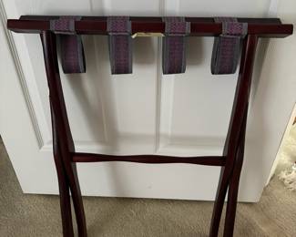 C47 - $20. Thomas Pacconi Classics Mahogany Finish Luggage Rack. Overall very good condition - has minor knicks in the wood. Measures 22" x 12" x 14" tall.